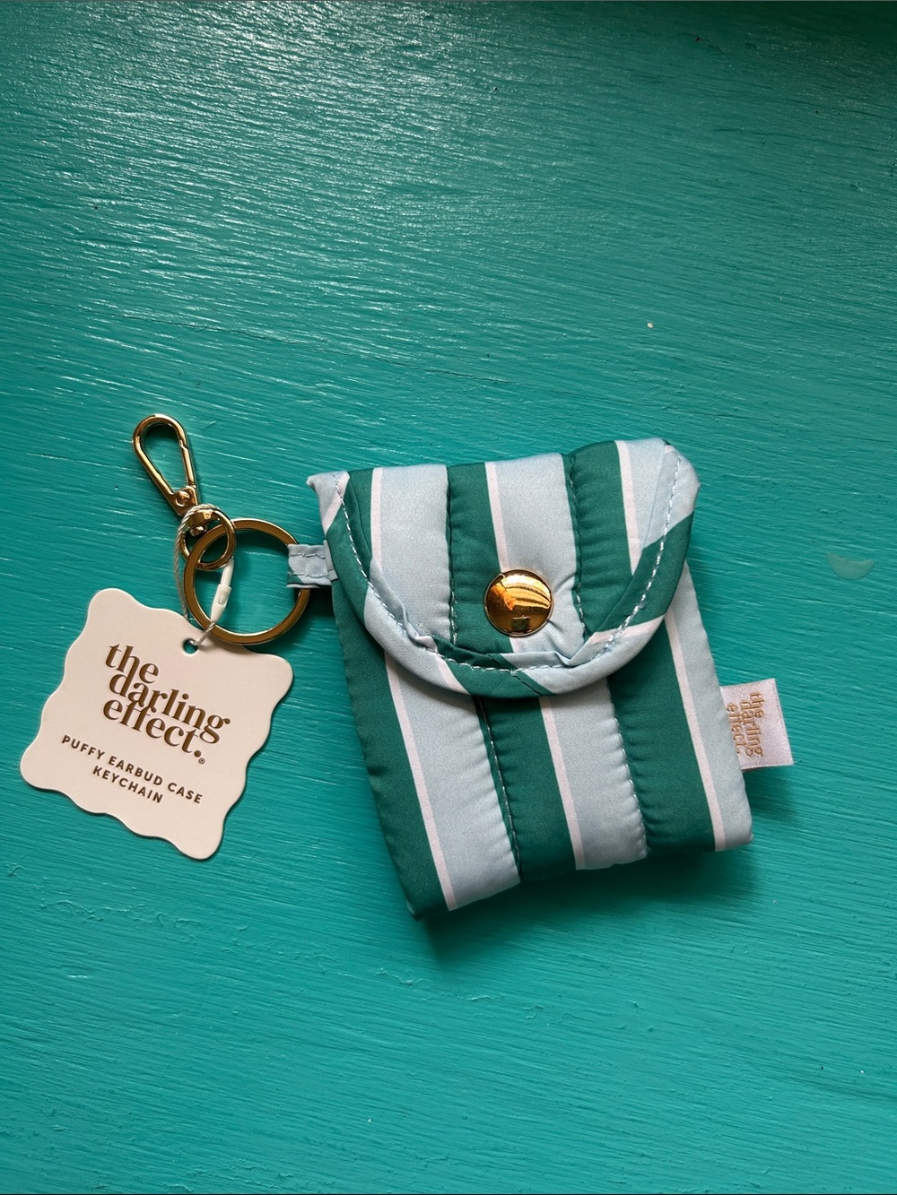 The Darling Effect Green Striped Puffy Earbud Case Keychain